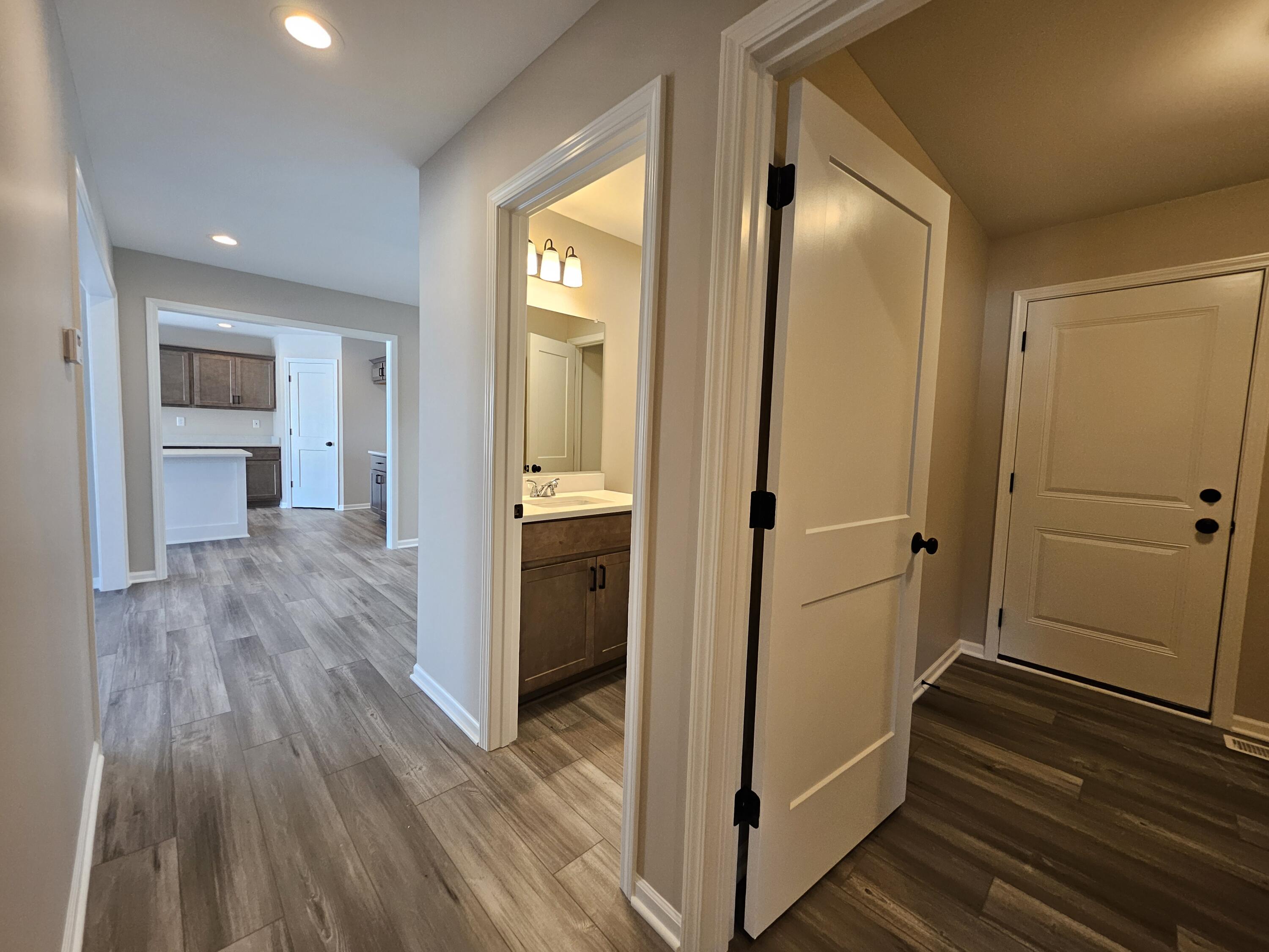5012 Stephen Lane Lowell, IN 46356 - Photo 22 of 46 a view of a hallway with wooden floor and closet area