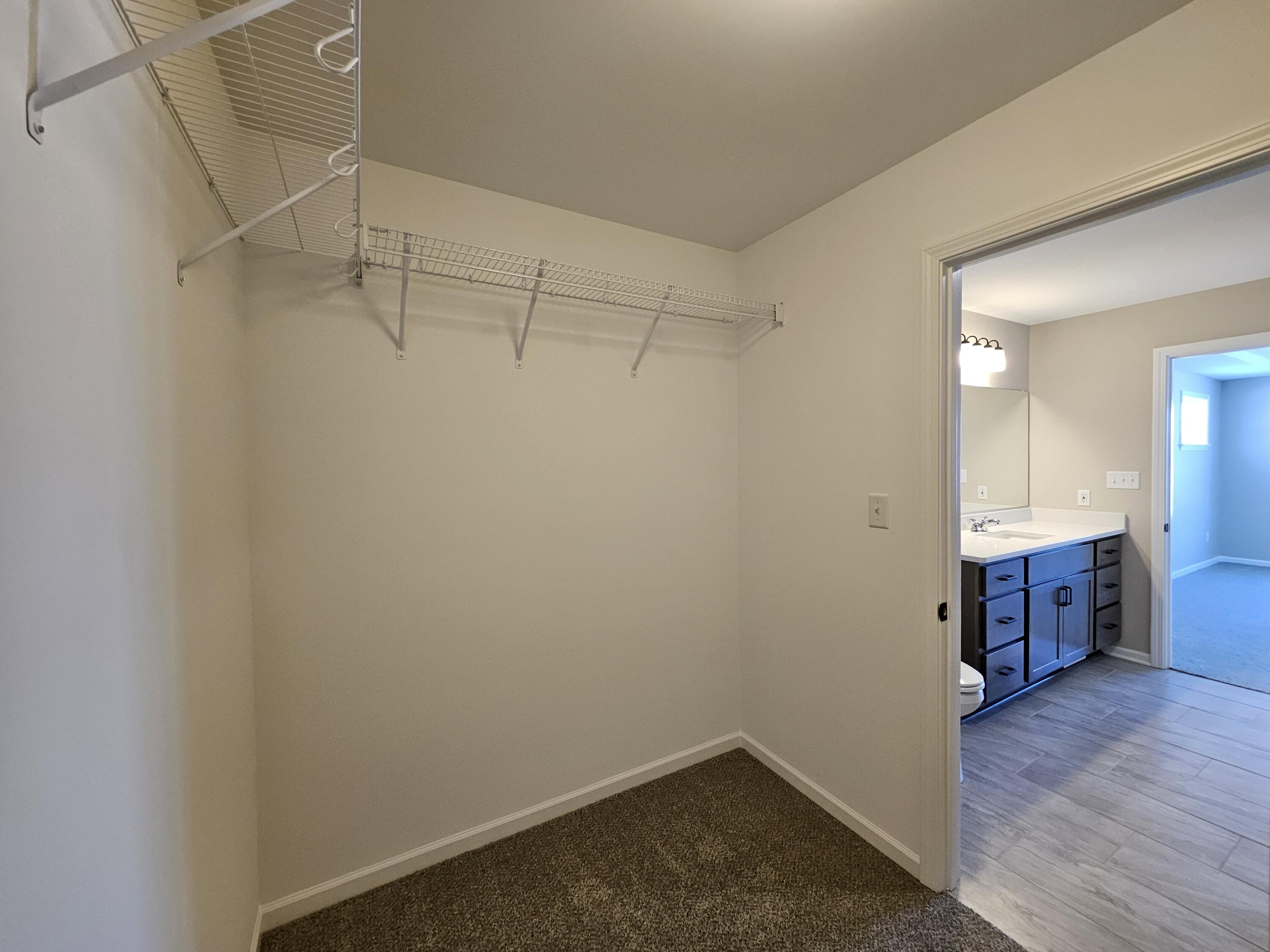 5012 Stephen Lane Lowell, IN 46356 - Photo 27 of 46 a view of a room with wooden floor and white walls