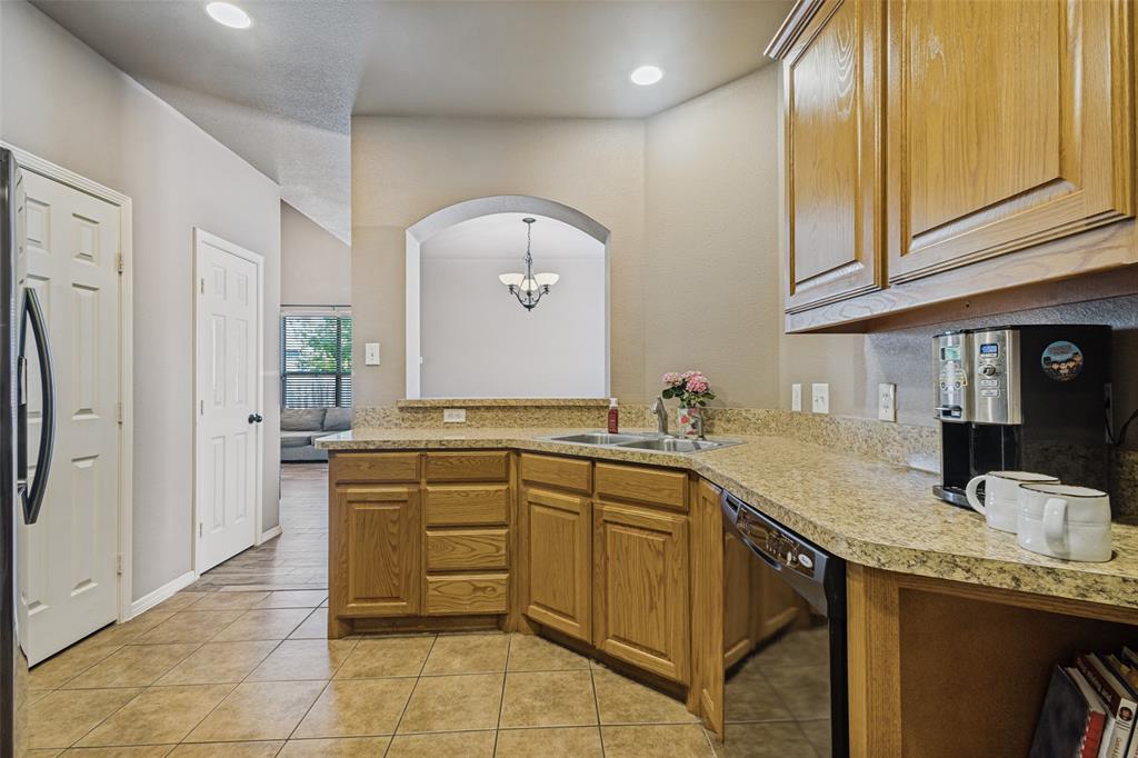 1 Pleasant Valley Sanger, TX 76266 - Photo 10 of 37 Ample counter space can be found on either side of the sink.