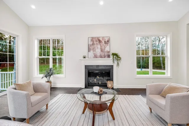 a bathroom with a sink toilet and a mirror