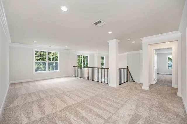 a view of room with table and chair