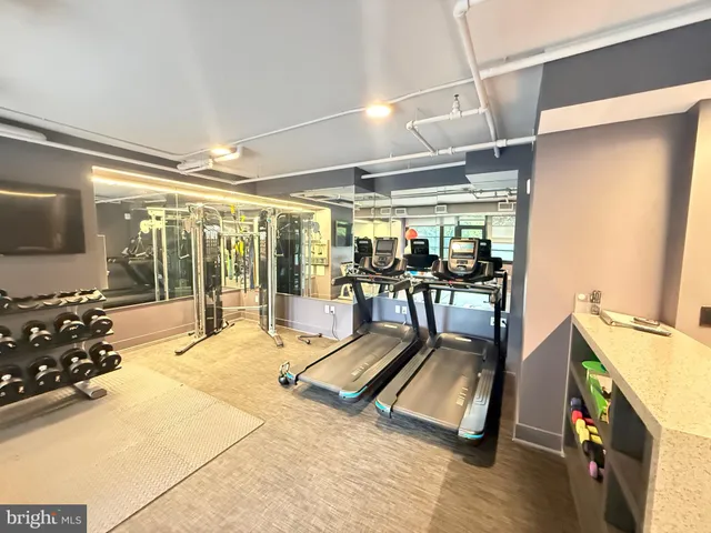 a view of a room with gym equipment