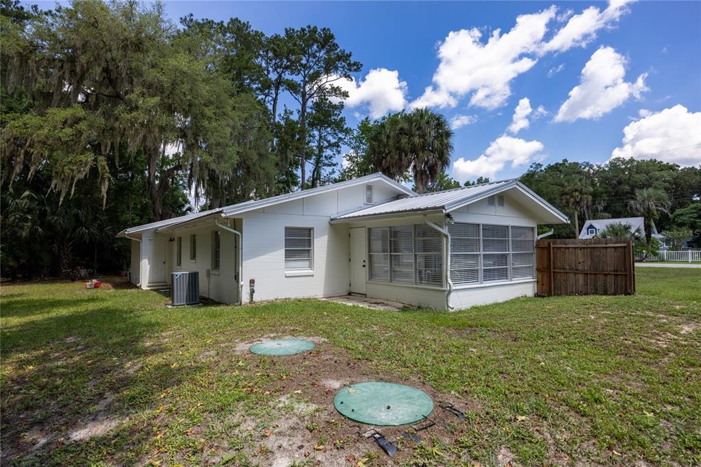 113 Browns Road San Mateo, FL 32187 - Photo 28 of 36 a view of a house with yard and sitting area