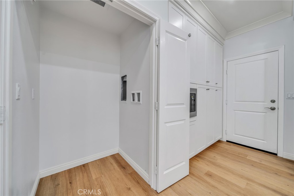 113 Mayfair Irvine, CA 92620 - Photo 14 of 31 wooden floor in an empty room
