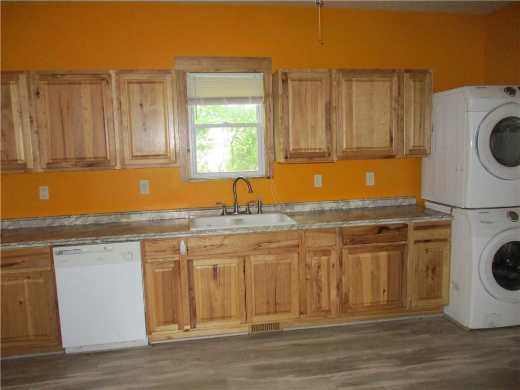 320 Main Street Lyndora, PA 16045 - Photo 7 of 11 a kitchen with wooden cabinets and a sink