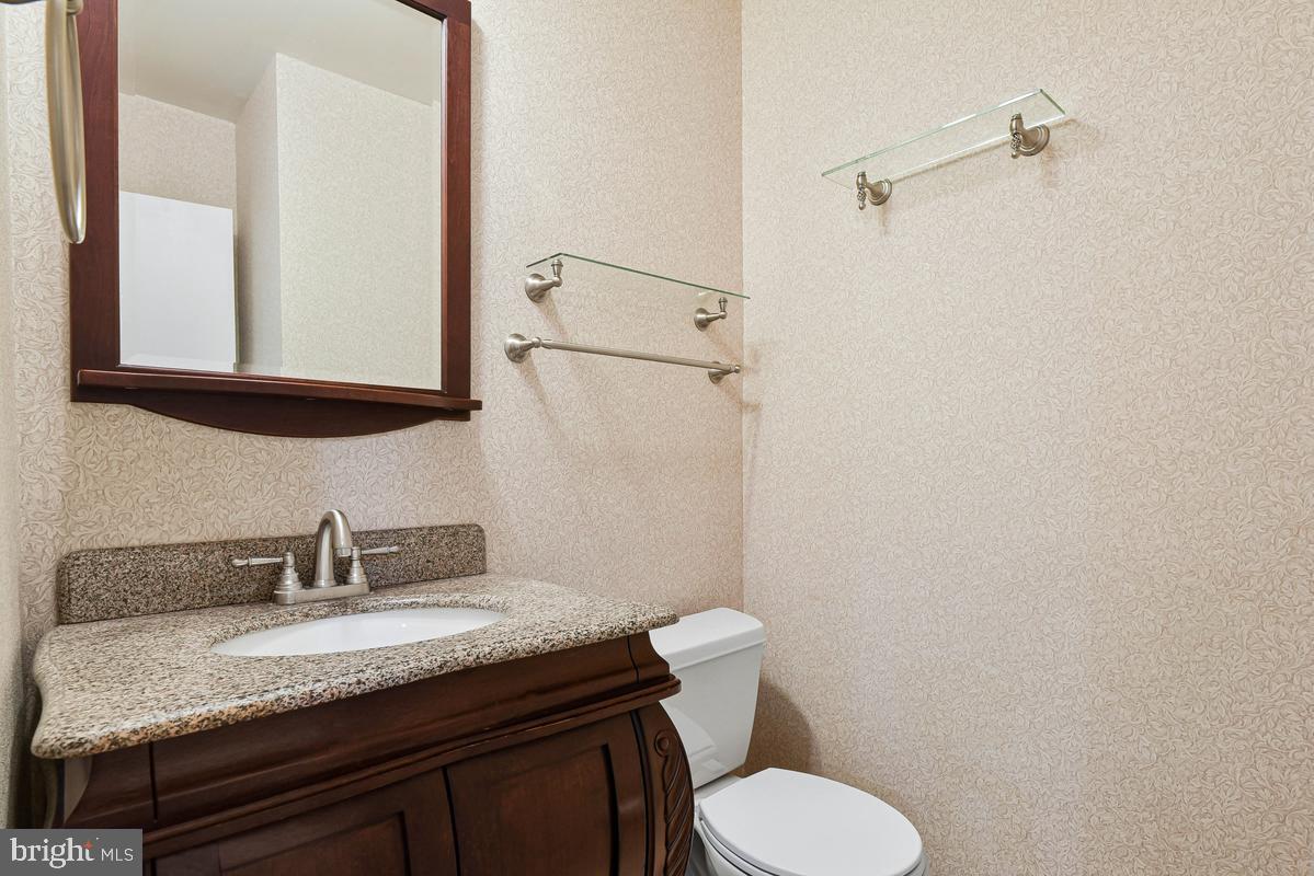 11814 Blue Spruce Road Reston, VA 20191 - Photo 15 of 56 Half bathroom on main level
