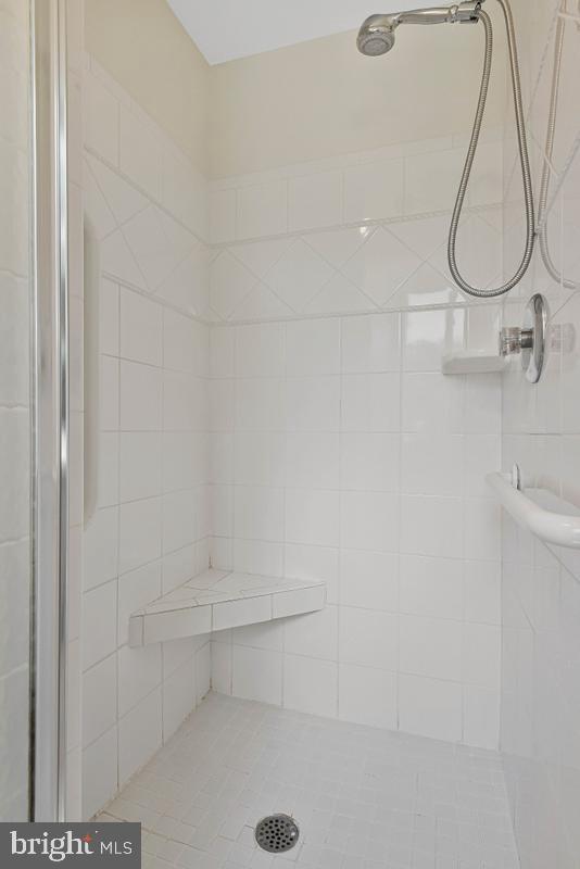 11814 Blue Spruce Road Reston, VA 20191 - Photo 28 of 56 a bathroom with a shower