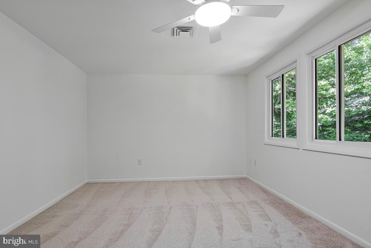 11814 Blue Spruce Road Reston, VA 20191 - Photo 33 of 56 an empty room with a window
