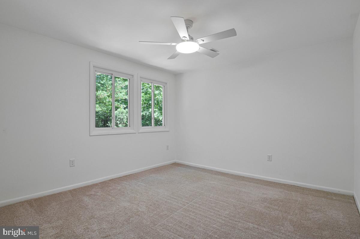 11814 Blue Spruce Road Reston, VA 20191 - Photo 36 of 56 an empty room with a window