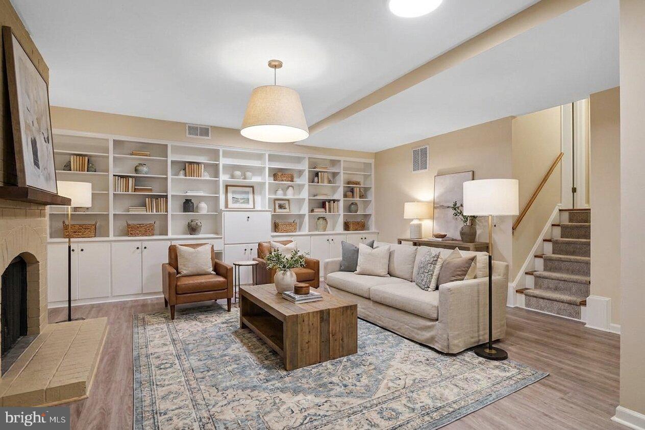 11814 Blue Spruce Road Reston, VA 20191 - Photo 40 of 56 a living room with furniture and a large window