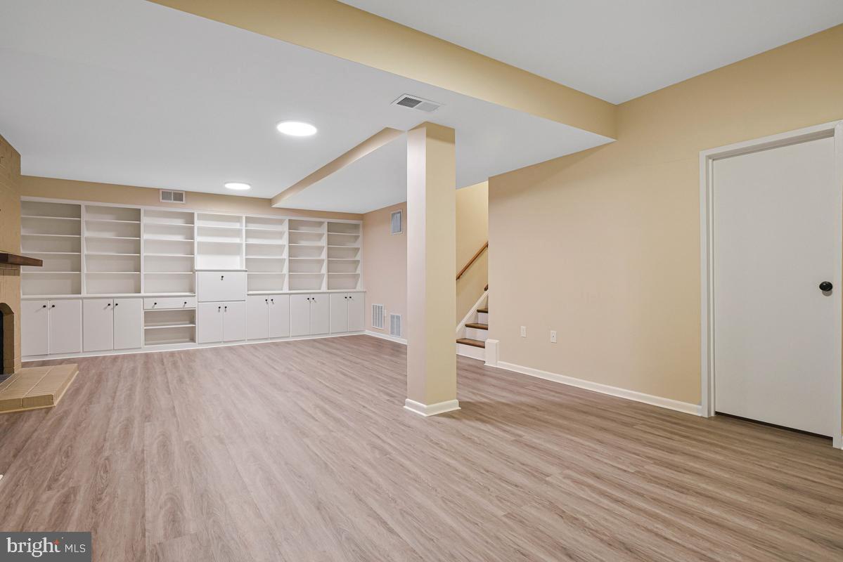 11814 Blue Spruce Road Reston, VA 20191 - Photo 43 of 56 wooden floor in an empty room with a window