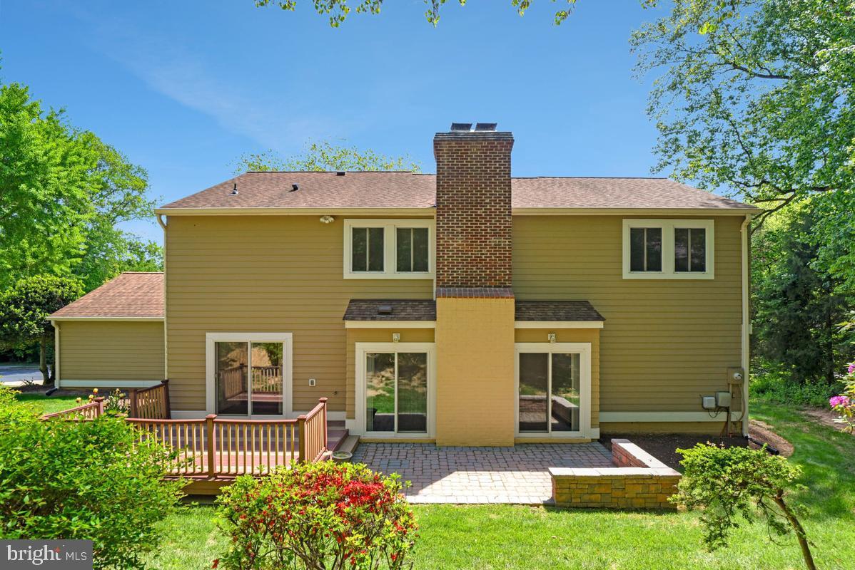 11814 Blue Spruce Road Reston, VA 20191 - Photo 49 of 56 a front view of a house with a yard