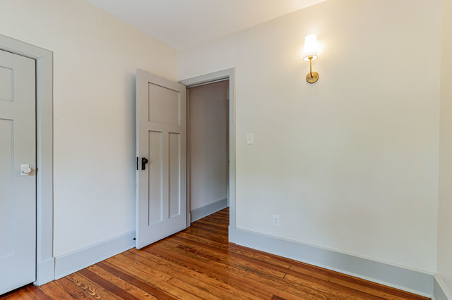 1616 West Church Street Champaign, IL 61821 - Photo 19 of 32 a view of a room with wooden floor
