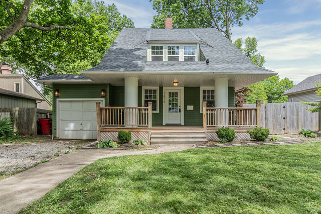 1616 West Church Street Champaign, IL 61821 - Photo 23 of 32 a view of a house with backyard and garden