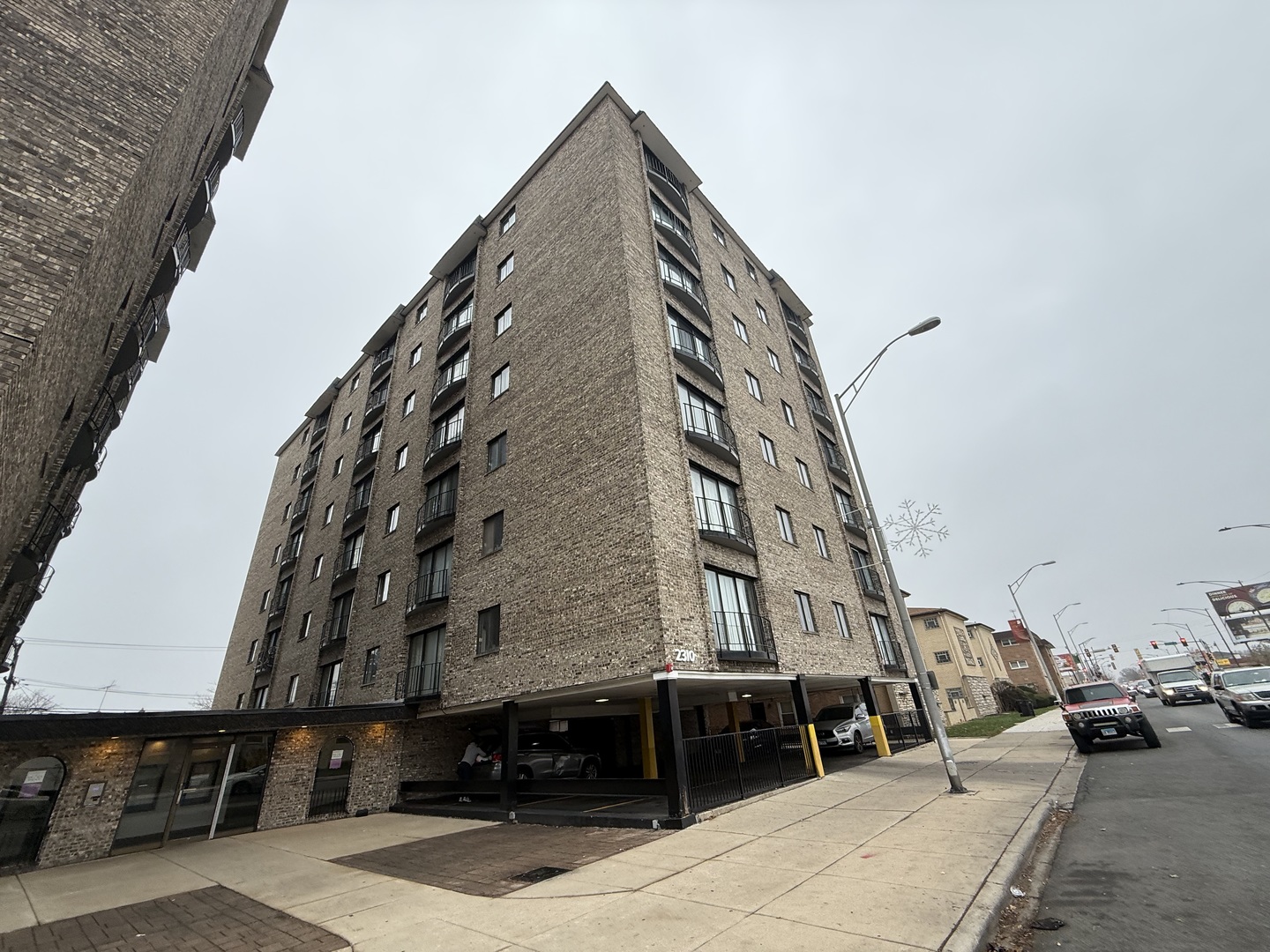 2300 North Harlem Avenue, Unit 205 Elmwood Park, IL 60707 - Photo 2 of 12 a view of a tall building