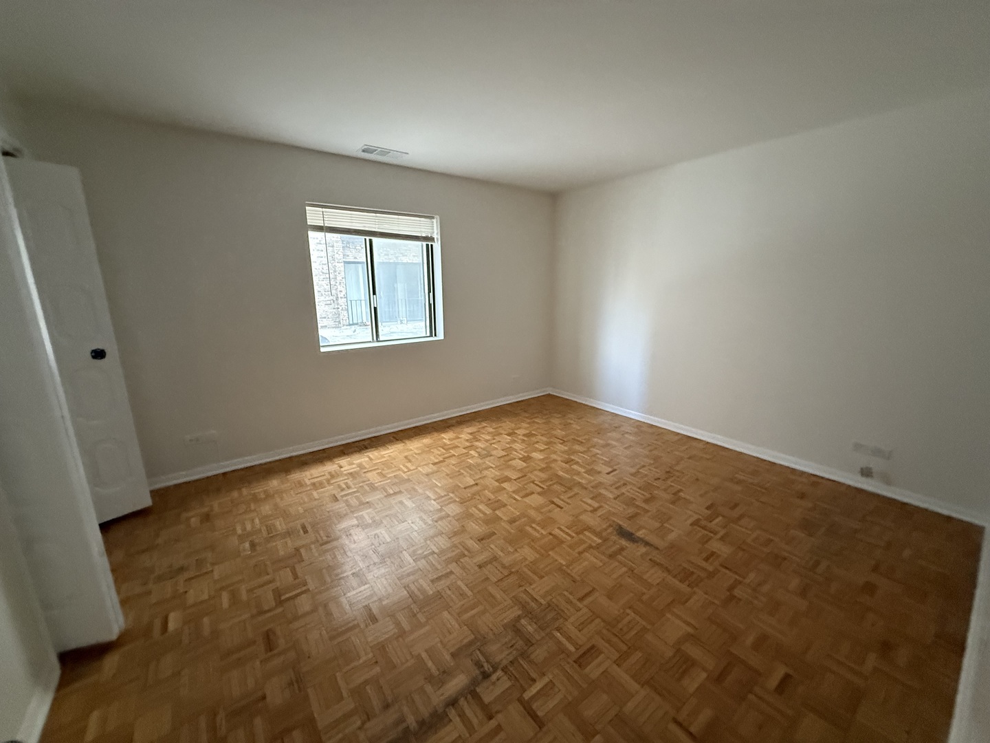 2300 North Harlem Avenue, Unit 205 Elmwood Park, IL 60707 - Photo 10 of 12 an empty room with a window