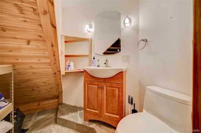 a view of two chairs in the balcony