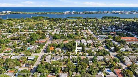 a view of a city with an ocean