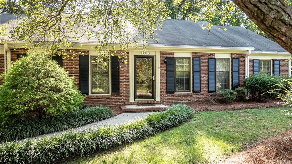 1708 Lawton Bluff Road Charlotte, NC 28226 - Photo 1 of 25 front view of a house with a yard