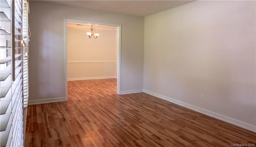 1708 Lawton Bluff Road Charlotte, NC 28226 - Photo 14 of 25 wooden floor in an empty room
