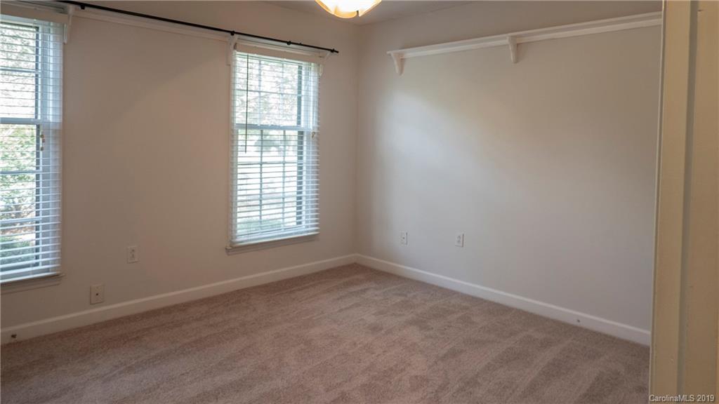 1708 Lawton Bluff Road Charlotte, NC 28226 - Photo 18 of 25 a view of an empty room with a window