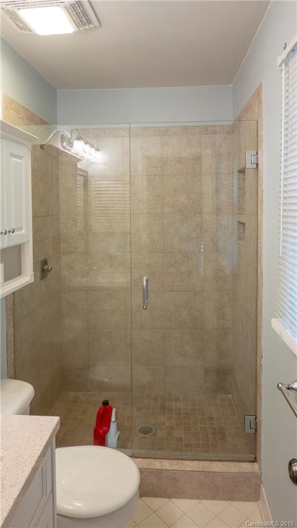 1708 Lawton Bluff Road Charlotte, NC 28226 - Photo 23 of 25 a bathroom with a shower and a toilet