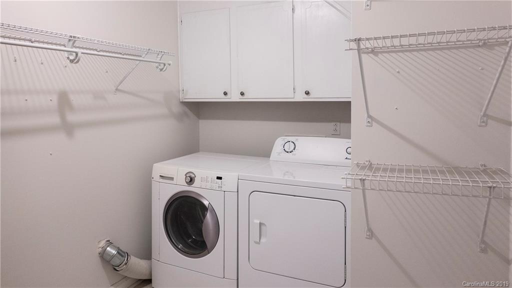 1708 Lawton Bluff Road Charlotte, NC 28226 - Photo 25 of 25 a utility room with dryer and washer