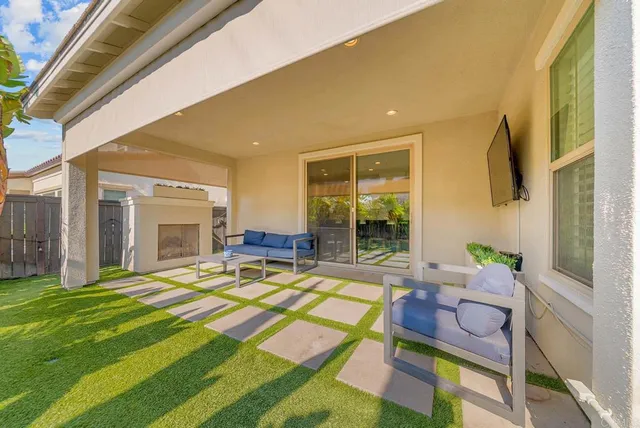 a view of balcony with wooden floor