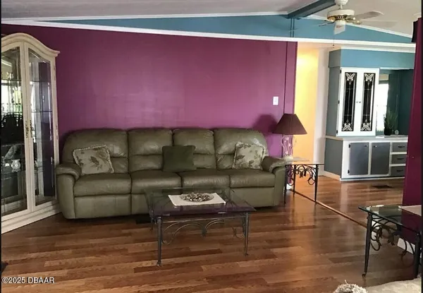 a view of livingroom with furniture and window