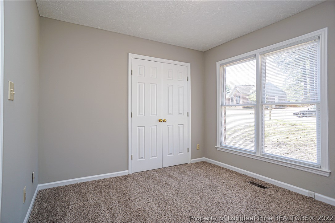 5094 Summer Ridge Road Fayetteville, NC 28303 - Photo 17 of 30 a view of an empty room with a window