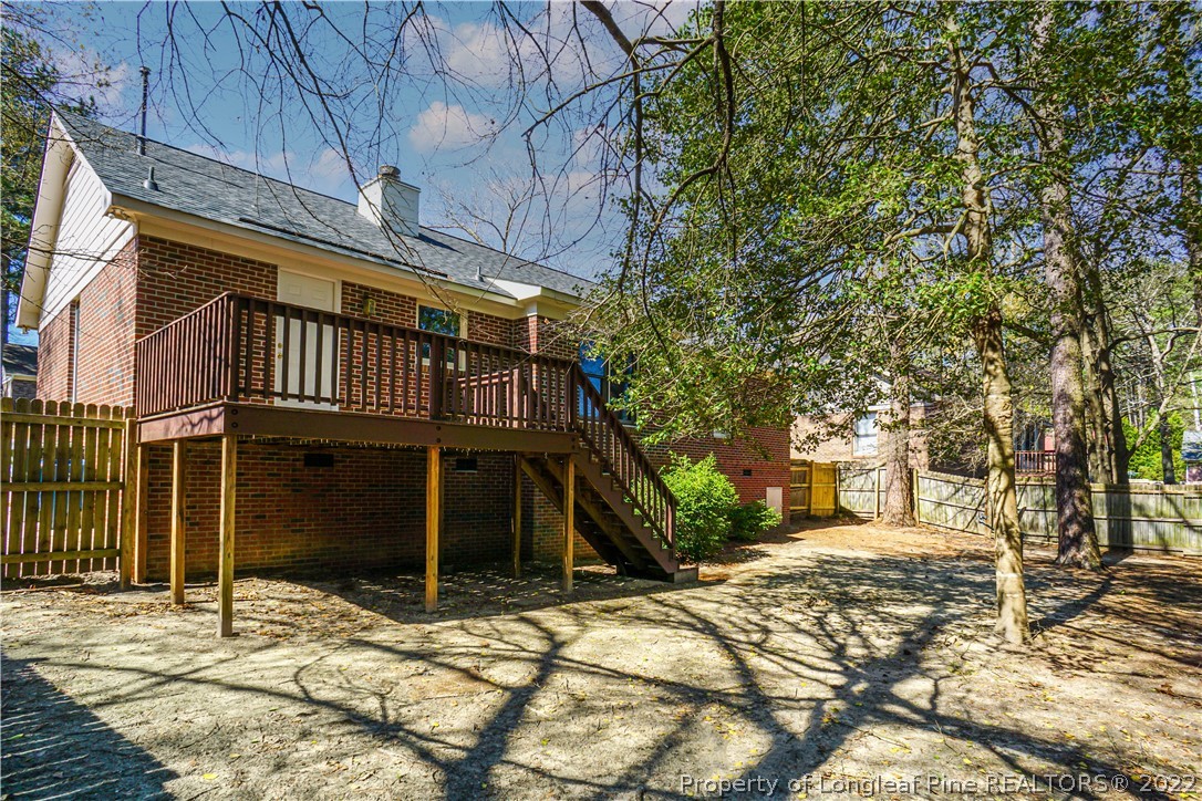 5094 Summer Ridge Road Fayetteville, NC 28303 - Photo 2 of 30 a front view of a house with a yard