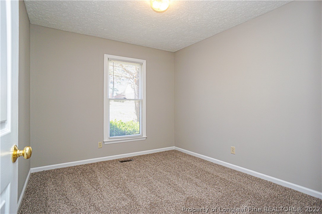 5094 Summer Ridge Road Fayetteville, NC 28303 - Photo 23 of 30 an empty room with windows