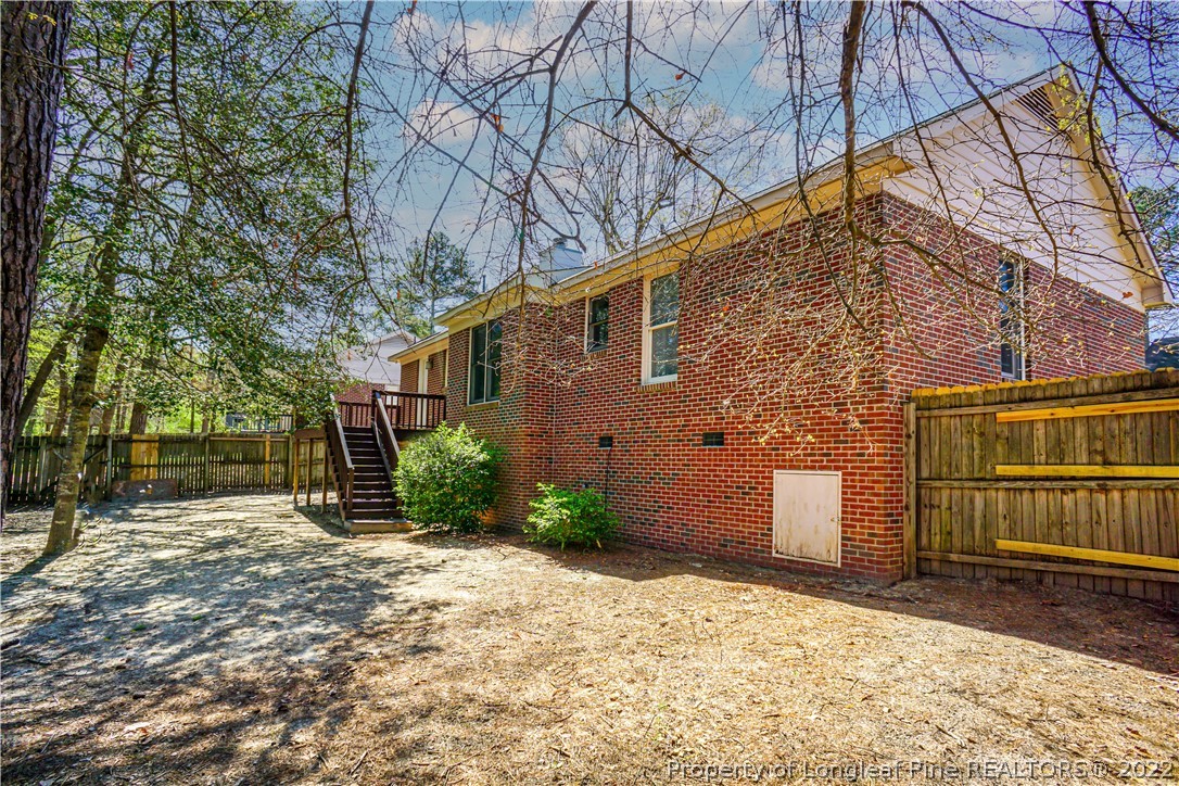 5094 Summer Ridge Road Fayetteville, NC 28303 - Photo 29 of 30 a backyard of a house