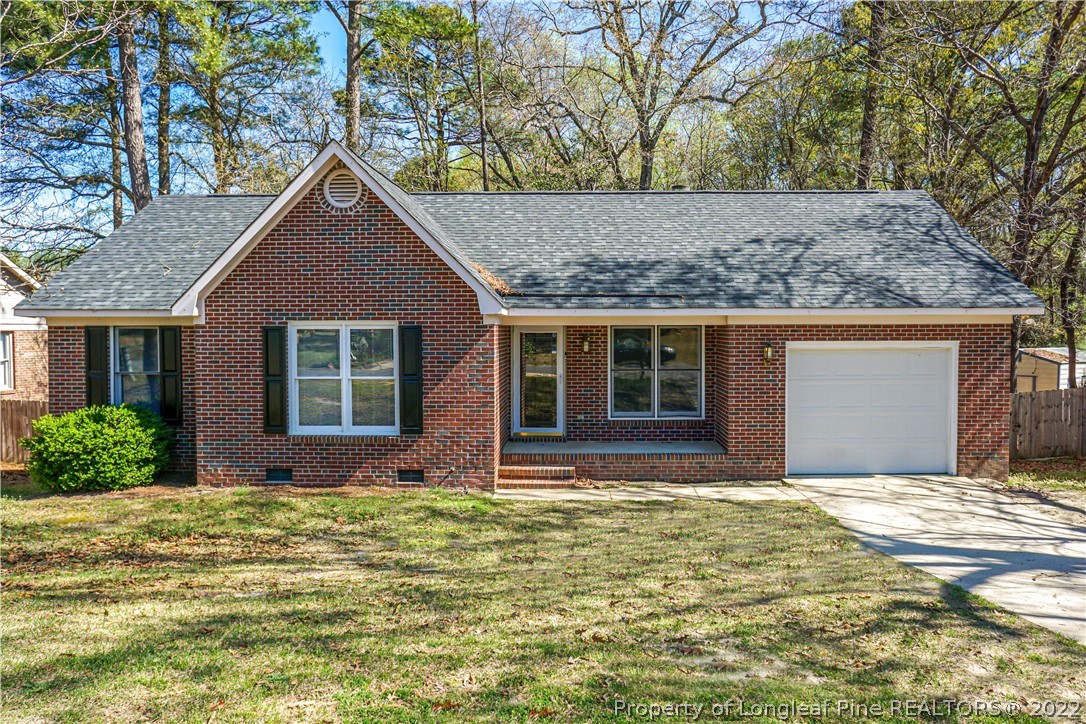 5094 Summer Ridge Road Fayetteville, NC 28303 - Photo 30 of 30 a front view of a house with garden