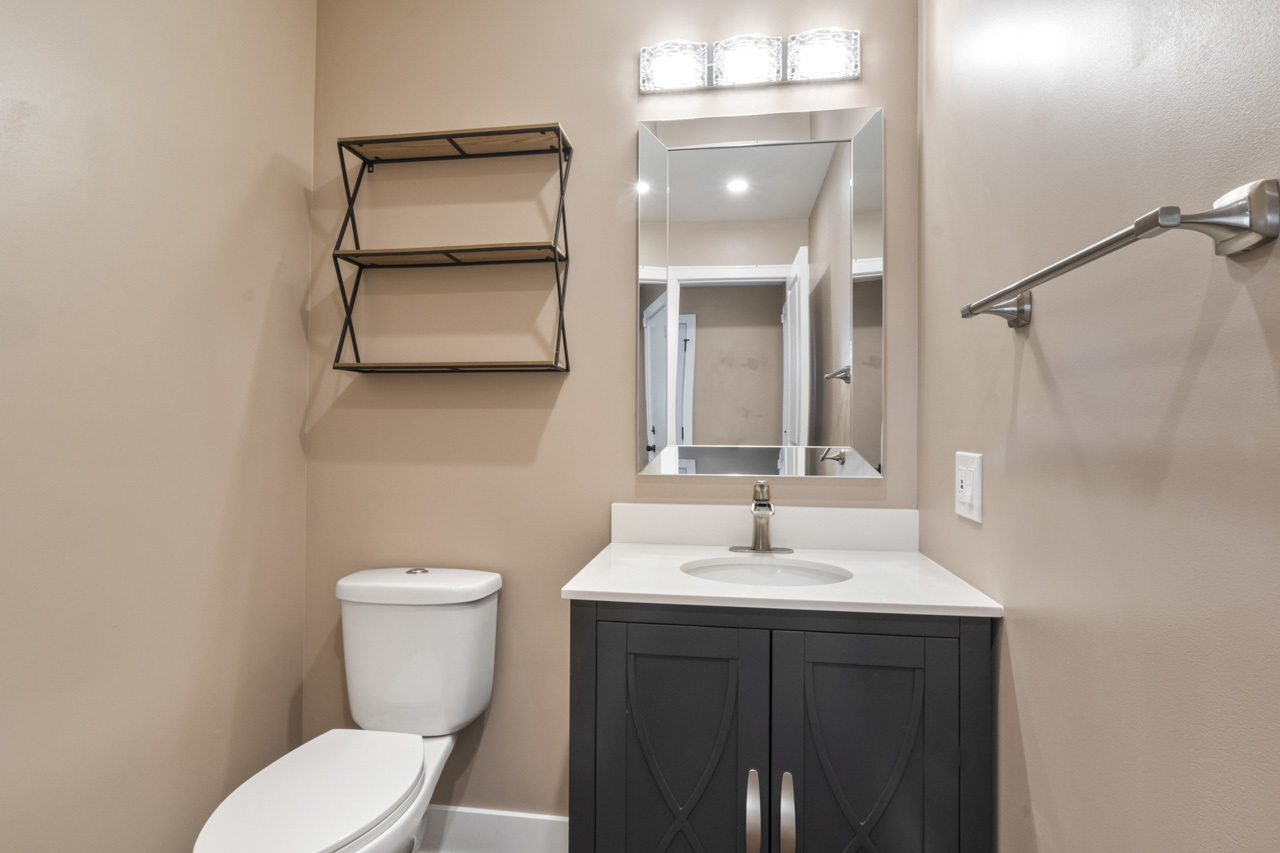 25782 West Prairieview Road Round Lake, IL 60073 - Photo 15 of 34 a bathroom with a sink and a mirror