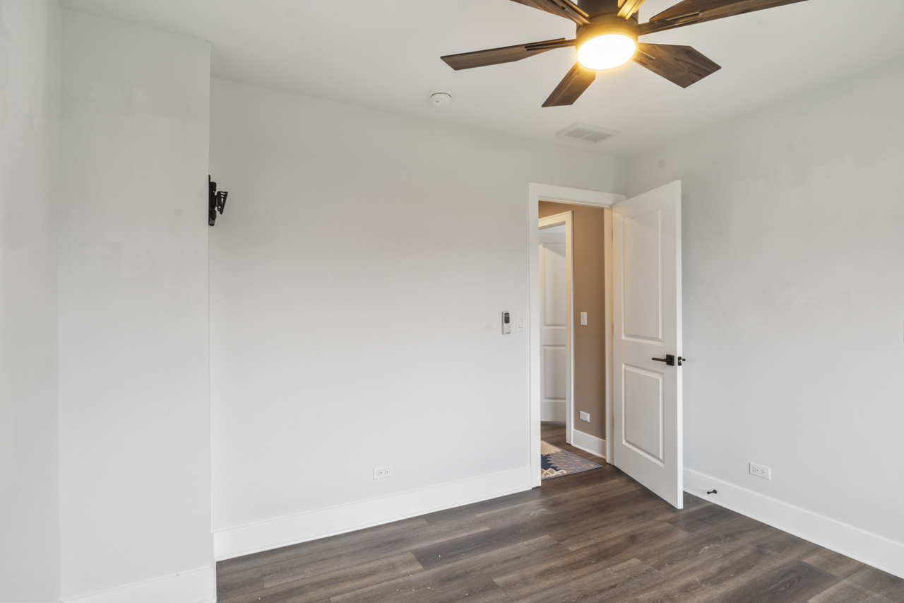 25782 West Prairieview Road Round Lake, IL 60073 - Photo 24 of 34 a view of an empty room with wooden floor