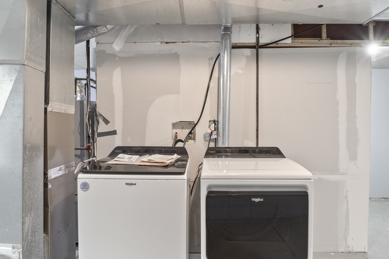 25782 West Prairieview Road Round Lake, IL 60073 - Photo 27 of 34 a utility room with dryer and washer