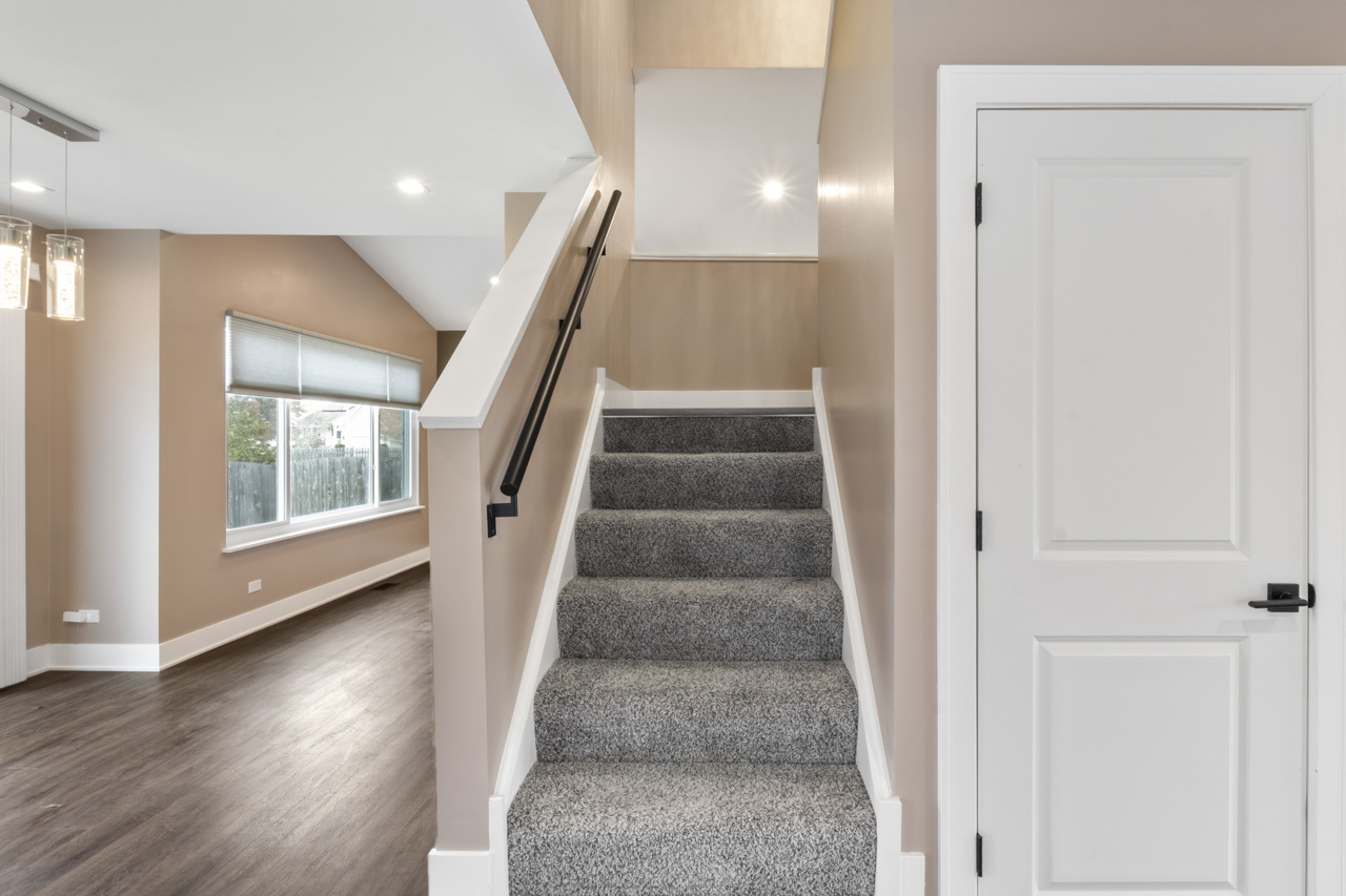 25782 West Prairieview Road Round Lake, IL 60073 - Photo 5 of 34 a view of an entryway with wooden floor and door