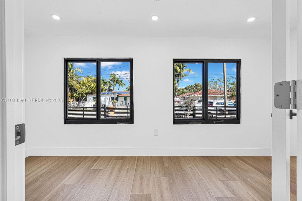3040 Northwest 13th Avenue Miami, FL 33142 - Photo 32 of 46 a view of windows and with wooden floor