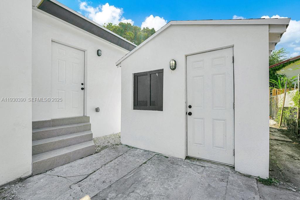 3040 Northwest 13th Avenue Miami, FL 33142 - Photo 40 of 46 a view of an entrance to house