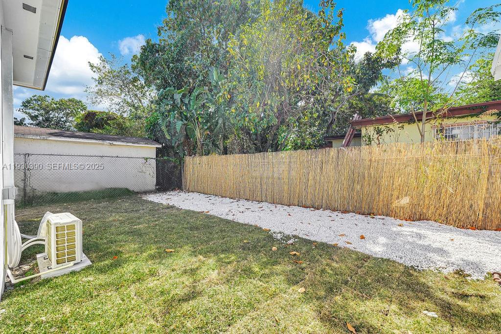 3040 Northwest 13th Avenue Miami, FL 33142 - Photo 41 of 46 a backyard of a house