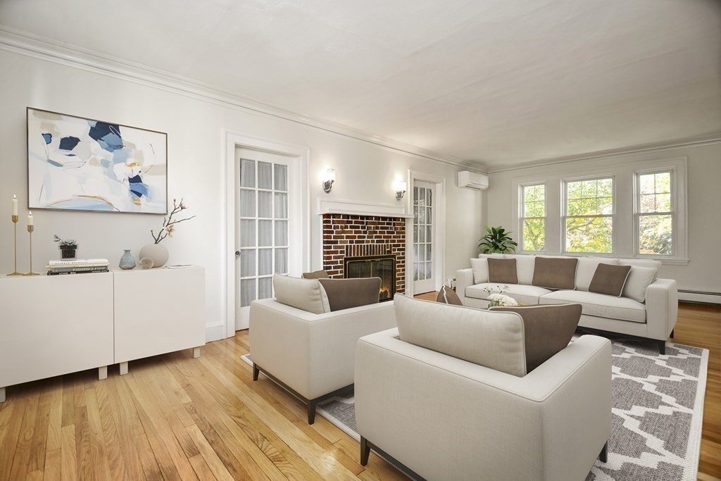121 Lovell Road Watertown, MA 02472 - Photo 4 of 22 a living room with furniture and a large window
