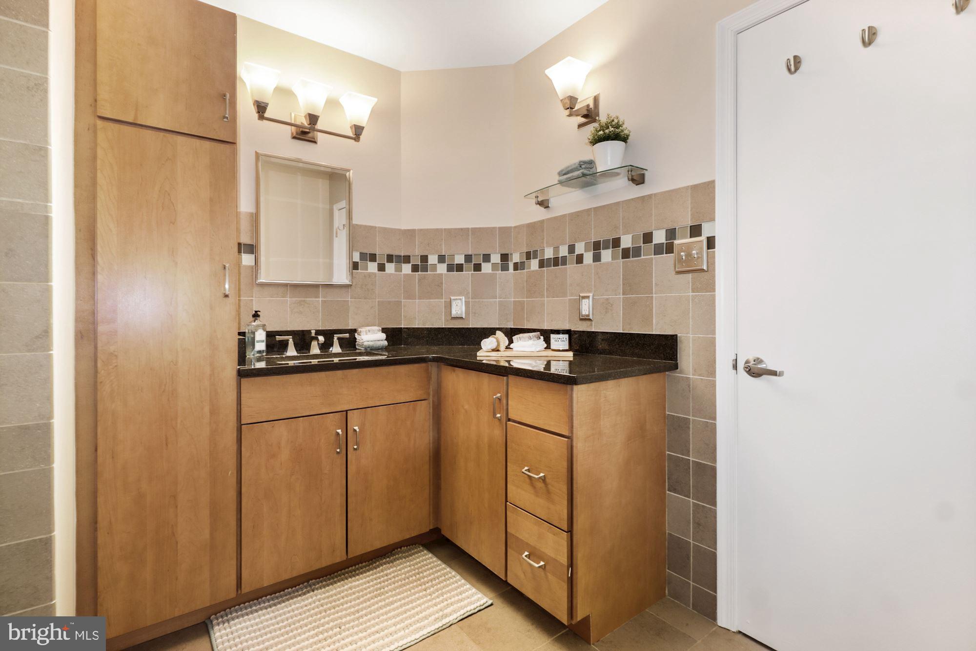 1029 North Stuart Street, Unit 515 Arlington, VA 22201 - Photo 19 of 27 Updated Bathroom with Built-in Linen Closet