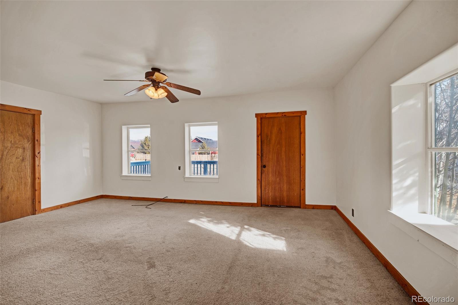 711 Front Street Fairplay, CO 80440 - Photo 11 of 40 a view of room with a ceiling fan and window