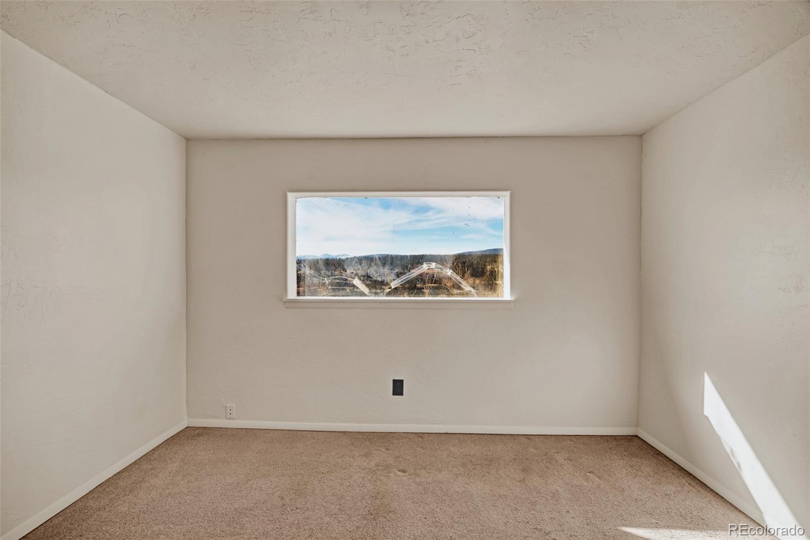 711 Front Street Fairplay, CO 80440 - Photo 20 of 40 an empty room with a window