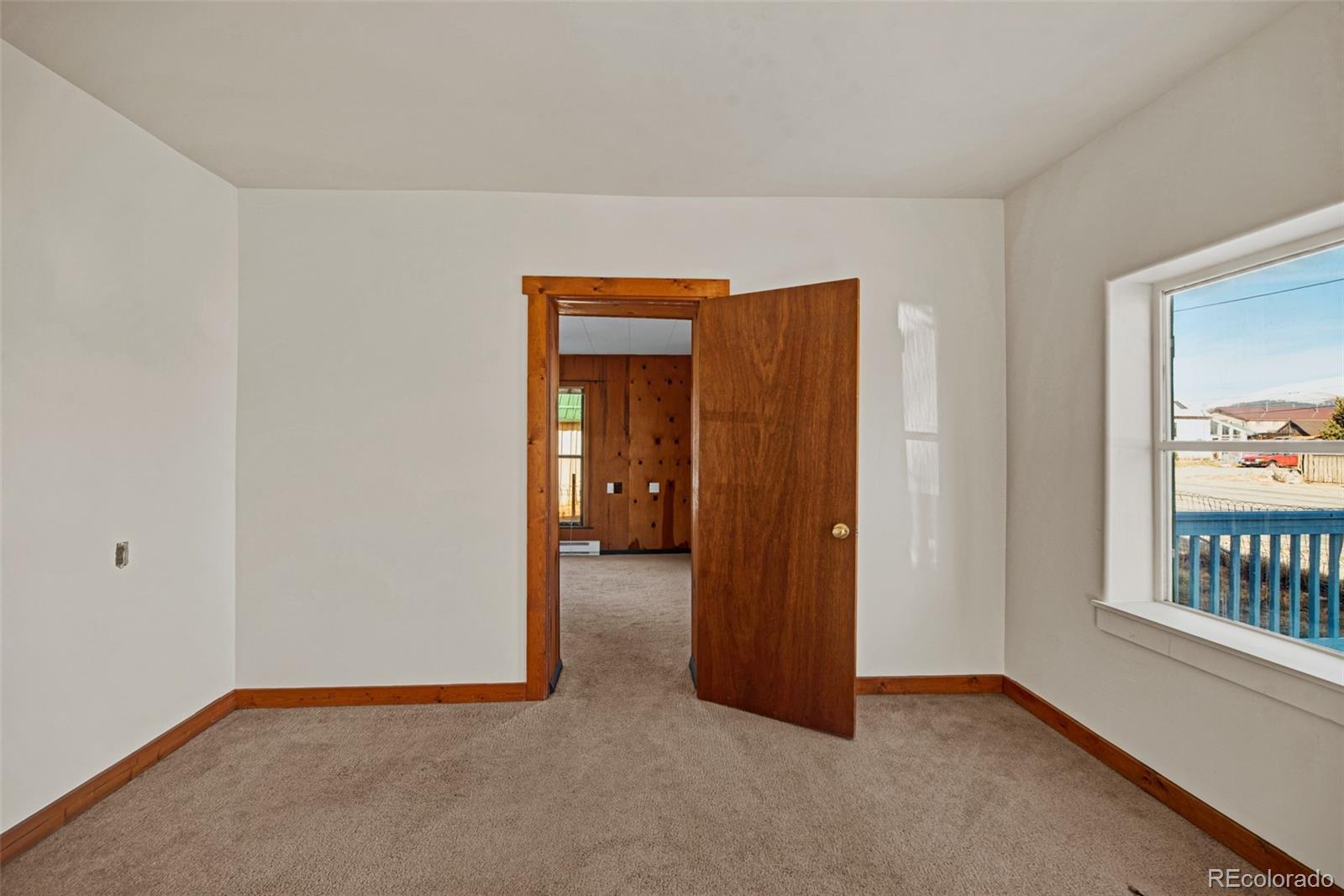 711 Front Street Fairplay, CO 80440 - Photo 23 of 40 an empty room with windows and closet