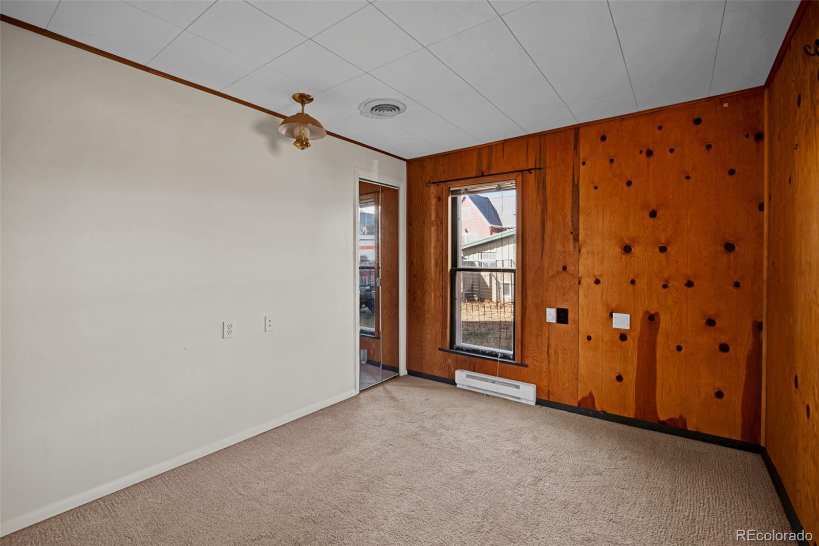 711 Front Street Fairplay, CO 80440 - Photo 24 of 40 a view of an empty room with a window