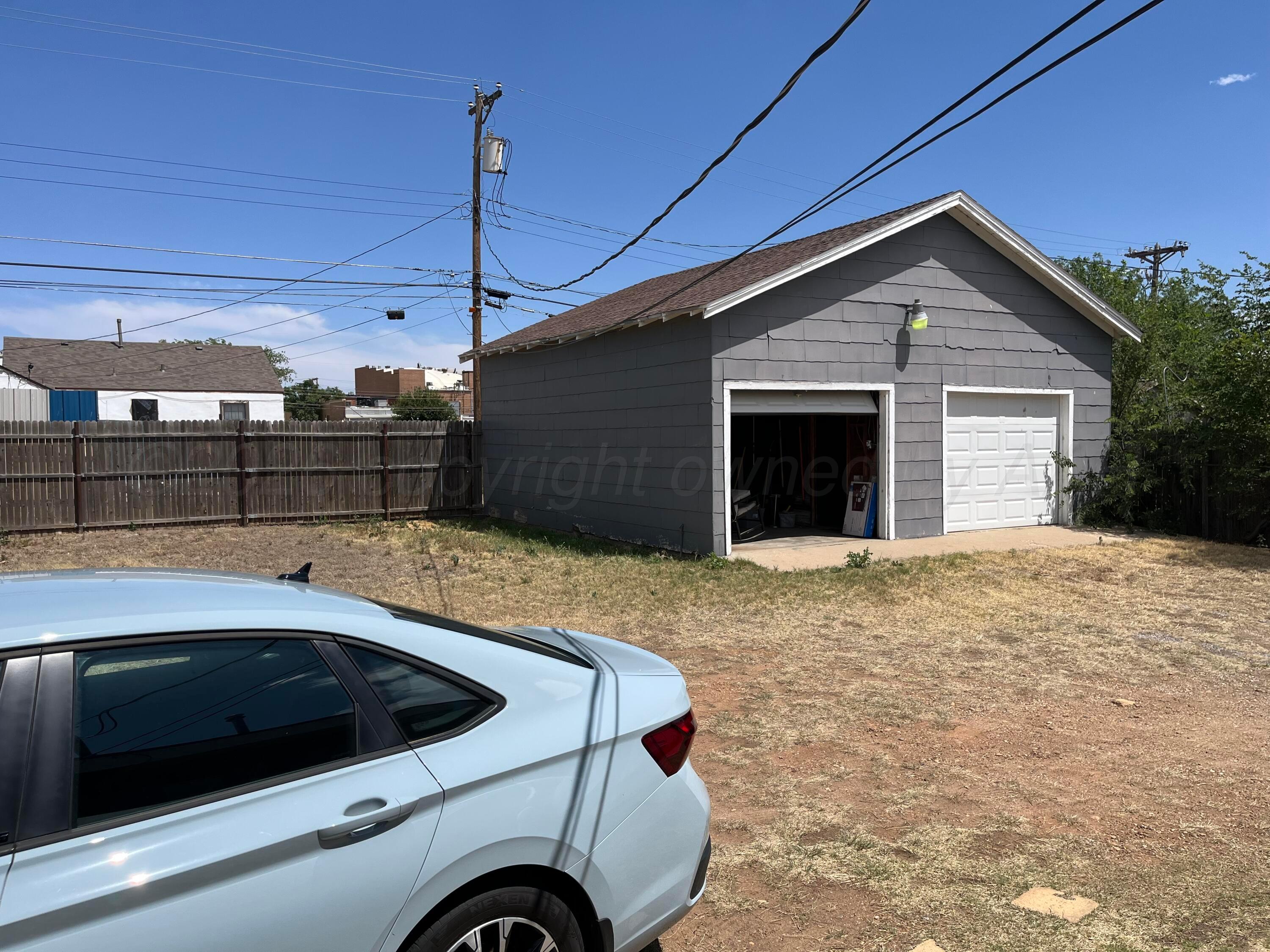 724 Coble Street Borger, TX 79007 - Photo 19 of 24 Backyard / 2 Car Garage