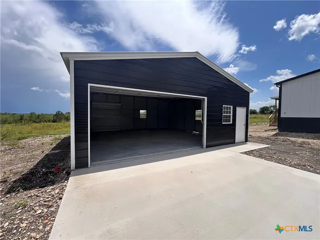 a view of a house with a outdoor space