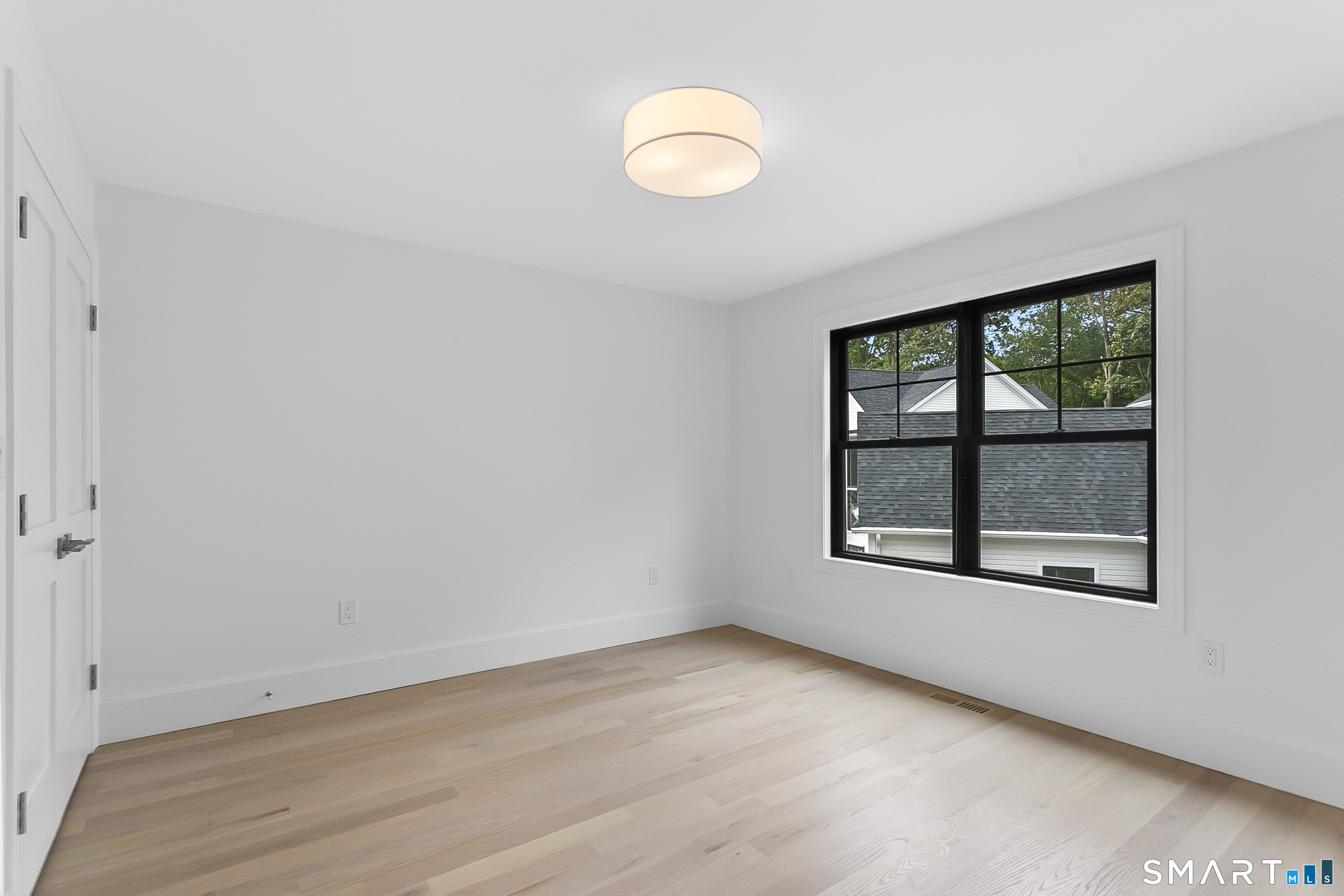 80 Oronoque Hills Road Stratford, CT 06614 - Photo 26 of 31 an empty room with a window